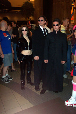 			<B>Trinity, an Agent, and Neo</B>
 from The Matrix