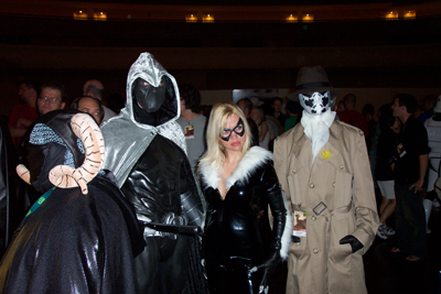 			<B>Unknown, Black Cat,and  Silk Spectre</B>
 from Unknown, Spider-Man, and Watchmen